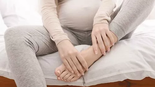 nhức mỏi tay chân có phải mang thai